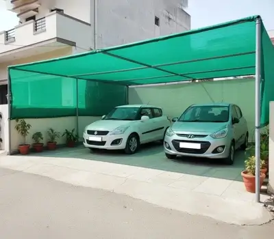 Car parking shade net structure with two cars underneath